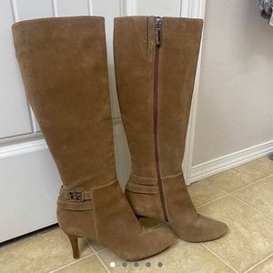 Knee high suede heeled boots. They’re Calvin Klein